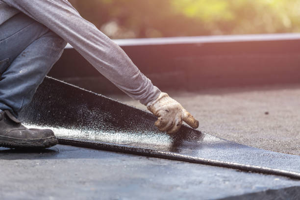 Professional Interior Drainage System technician working in Westbury, NY